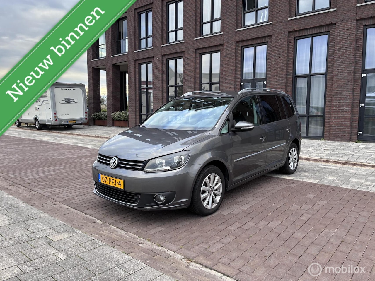 Volkswagen Touran - 1.4 TSI Highline 7p.Clima Cruise DSG - AutoWereld.nl