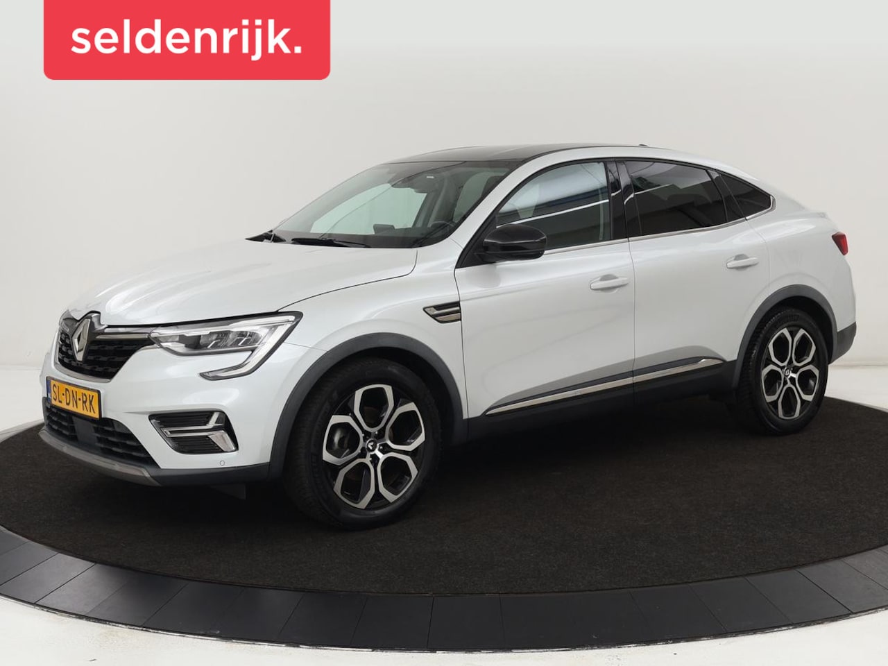 Renault Arkana - 1.6 E-Tech Hybrid 145 Intens | Adaptive cruise | Camera | Carplay | Half leder | Navigatie - AutoWereld.nl