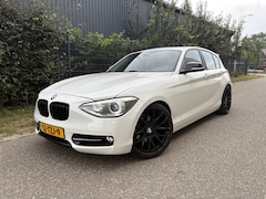 BMW 1-serie - 118i Business+ / AUTOMAAT / LEER / NAVI / SCHUIFDAK / CRUISE / STOELVERWARMING