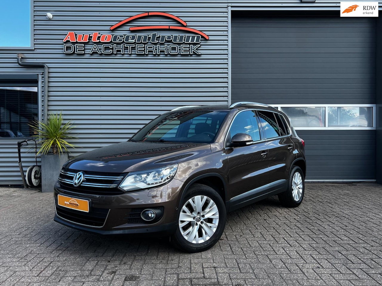Volkswagen Tiguan - 1.4 TSI Sport&Style Life 160PK | NAVI | Cruise - AutoWereld.nl