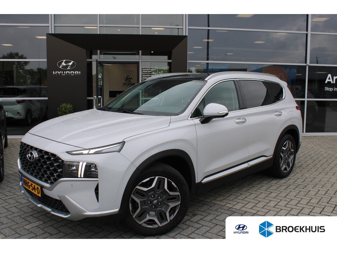 Hyundai Santa Fe - 1.6 T-GDI PHEV Premium Sky 7p. | Lederen bekleding | schuifdak | Achterbank in delen neerk - AutoWereld.nl