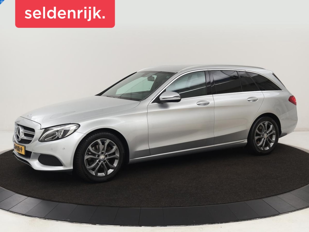 Mercedes-Benz C-klasse - 180 Avantgarde | Stoelverwarming | Half leder | Park Assist | Navigatie | Full LED | Cruis - AutoWereld.nl