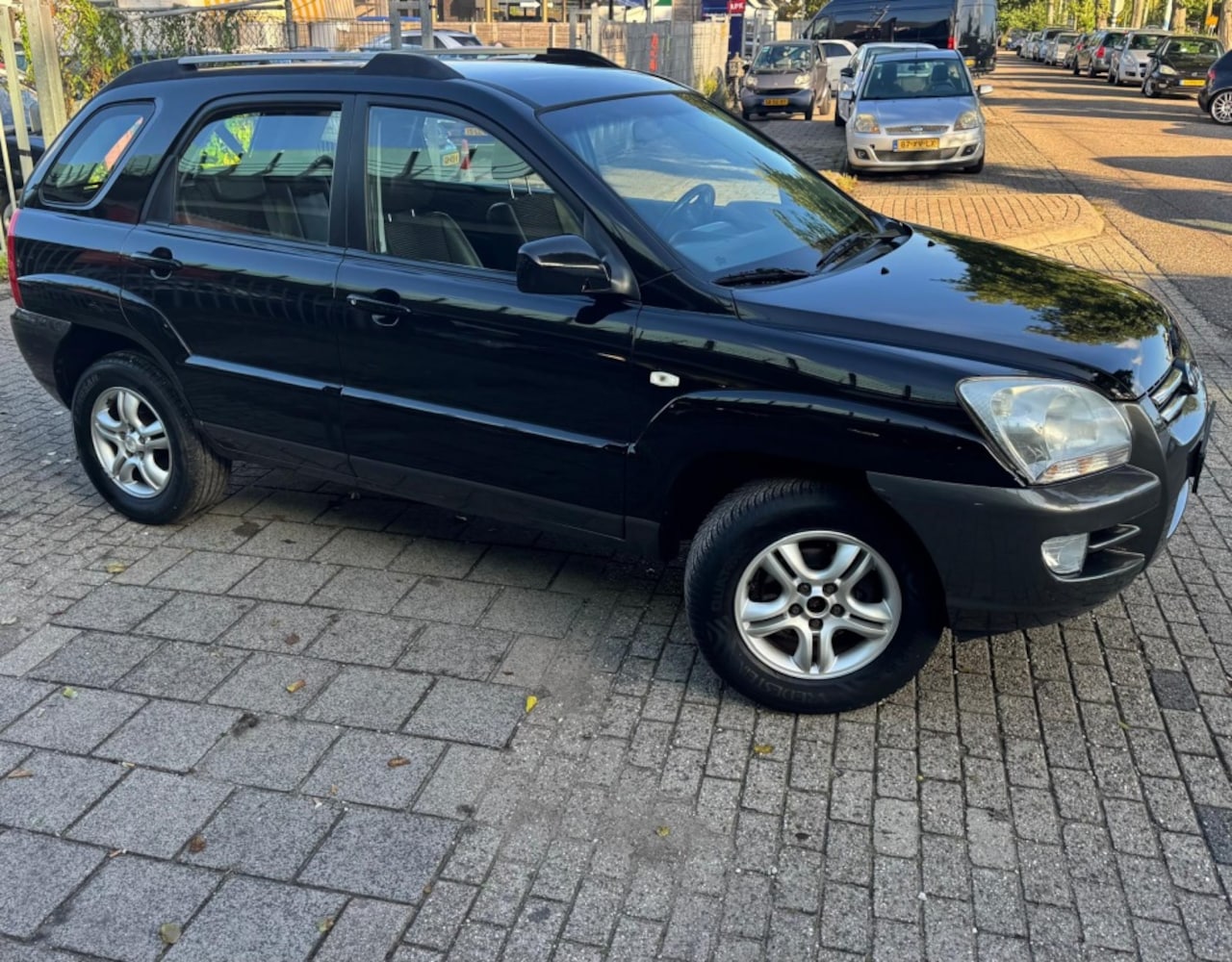 Kia Sportage - 2.0 CVVT Executive 2.0 CVVT Executive - AutoWereld.nl