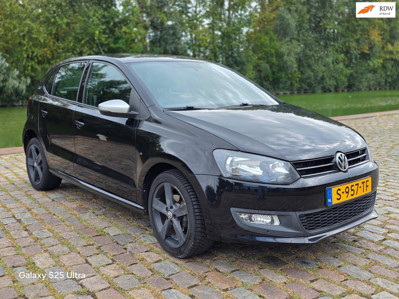 Volkswagen Polo - 1.2 Easyline airco navigatie leerbekeleding elektrische ramen cv op afs - AutoWereld.nl