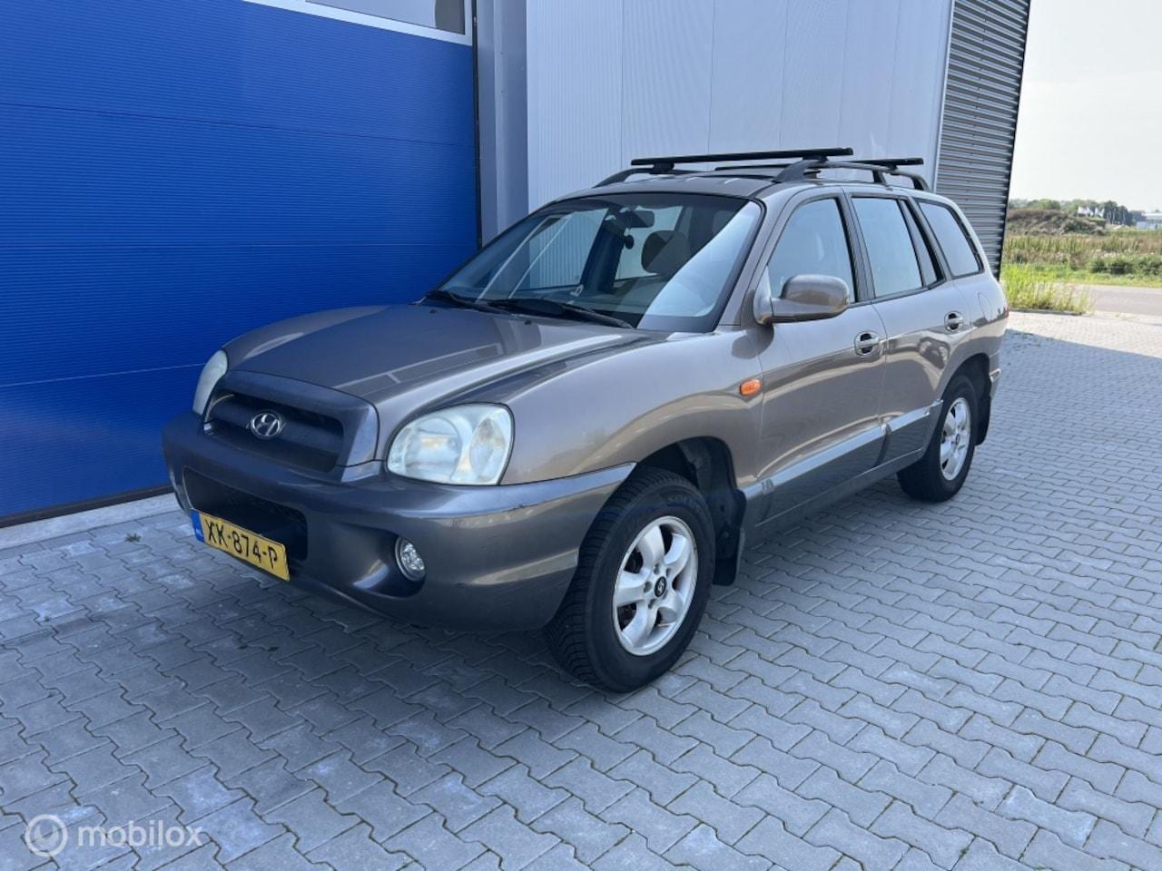Hyundai Santa Fe - 2.7i V6 4WD Style 2.7i V6 4WD Style - AutoWereld.nl
