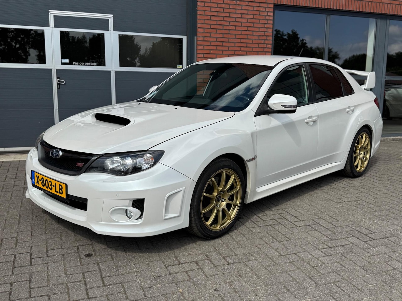 Subaru WRX STI - 2.5 T Sport invidia - AutoWereld.nl