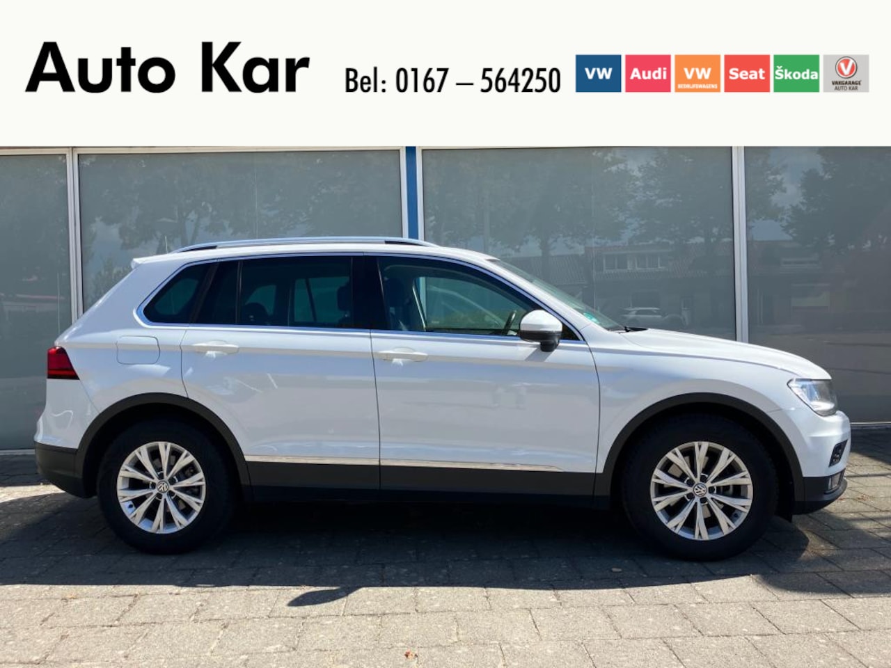 Volkswagen Tiguan - 1.5 TSI Comfortline Business Climatronic Trekhaak Elektronische klep - AutoWereld.nl