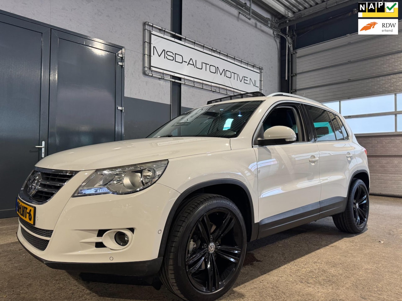 Volkswagen Tiguan - 1.4 TSI Sport&Style Panoramadak Trekhaak NAP - AutoWereld.nl