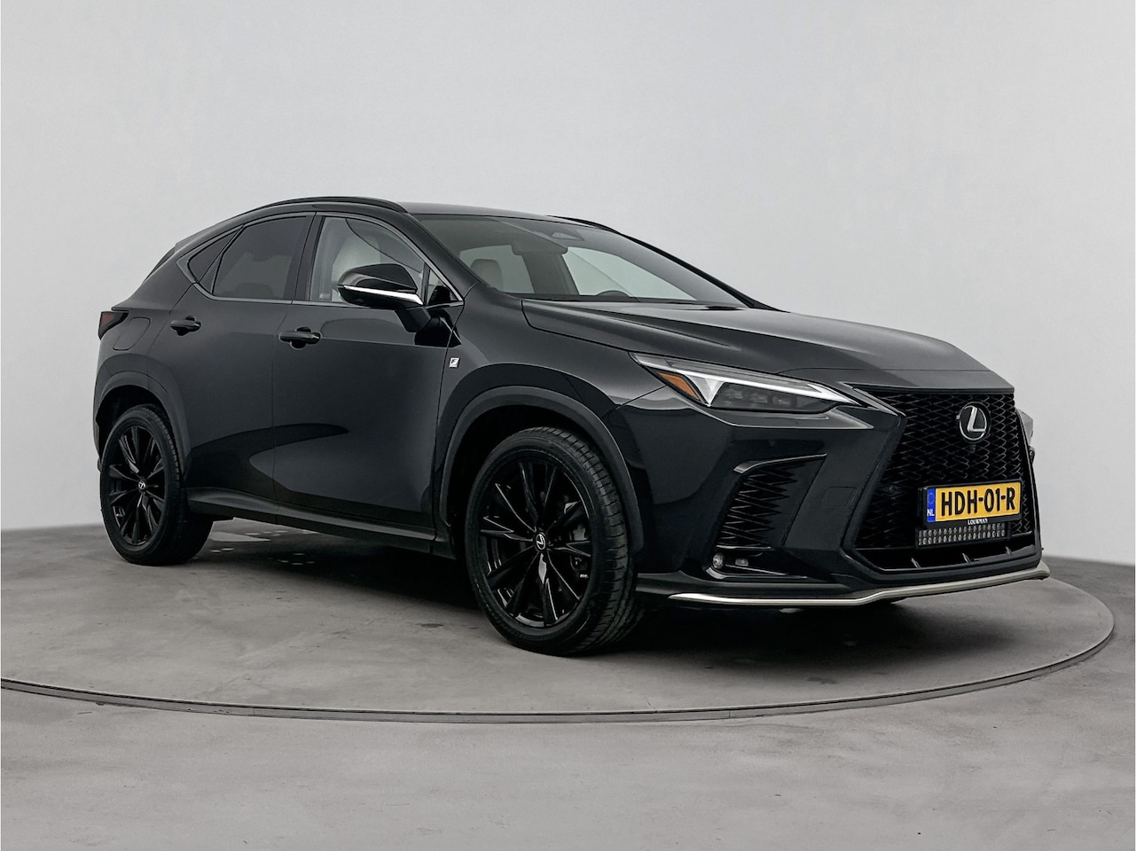 Lexus NX - 450h+ AWD F Sport Line | Stoel en stuurwiel verwarmd | LM velgen | Draadloze telefoonlader - AutoWereld.nl