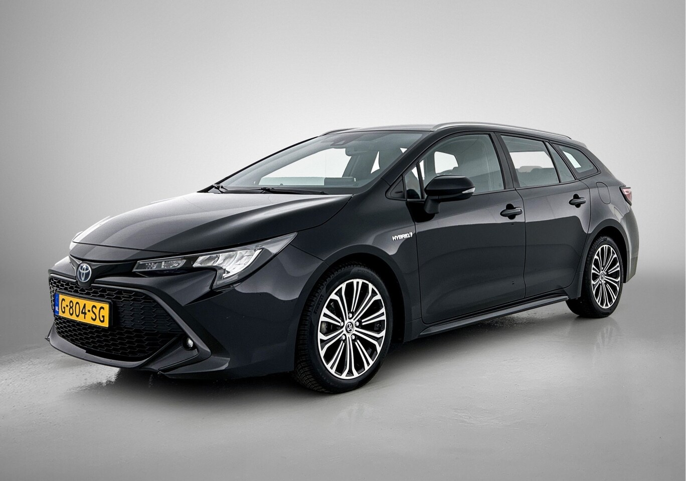 Toyota Corolla Touring Sports - 1.8 Hybrid Dynamic \ Navigatie | LM velgen | - AutoWereld.nl