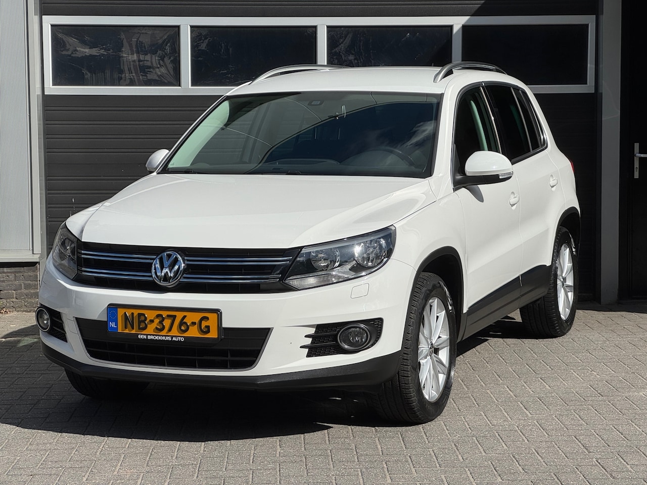 Volkswagen Tiguan - 1.4 TSI Sport&Style 4Motion Cruise Control, Stoelverwarming, Alcantara - AutoWereld.nl