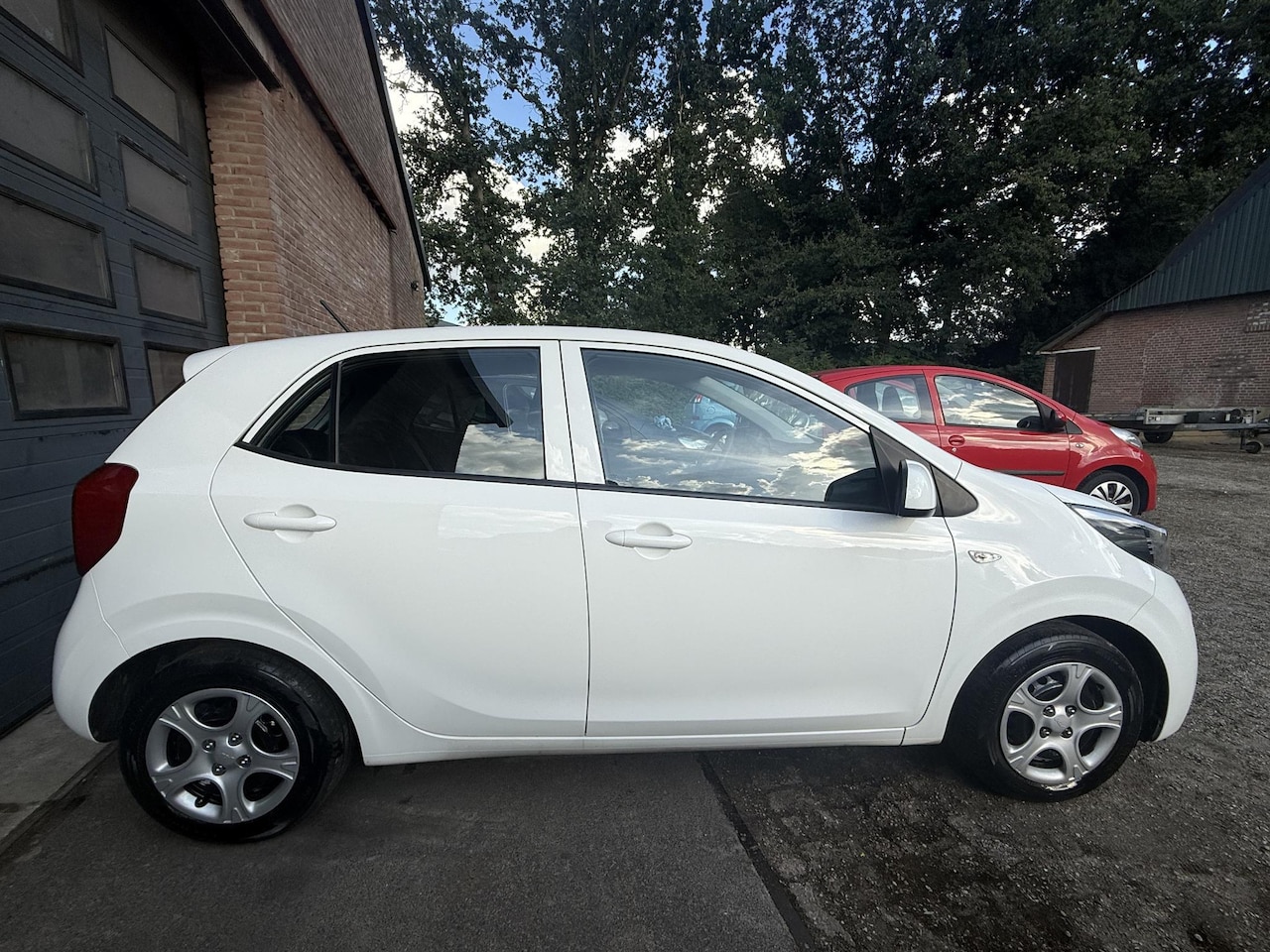 Kia Picanto - 1.0 DPi ComfortLine Airco/Cruise/DAB/NAP - AutoWereld.nl