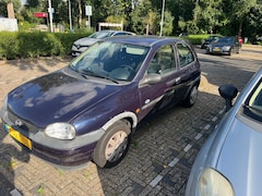 Opel Corsa - 1.4i Strada