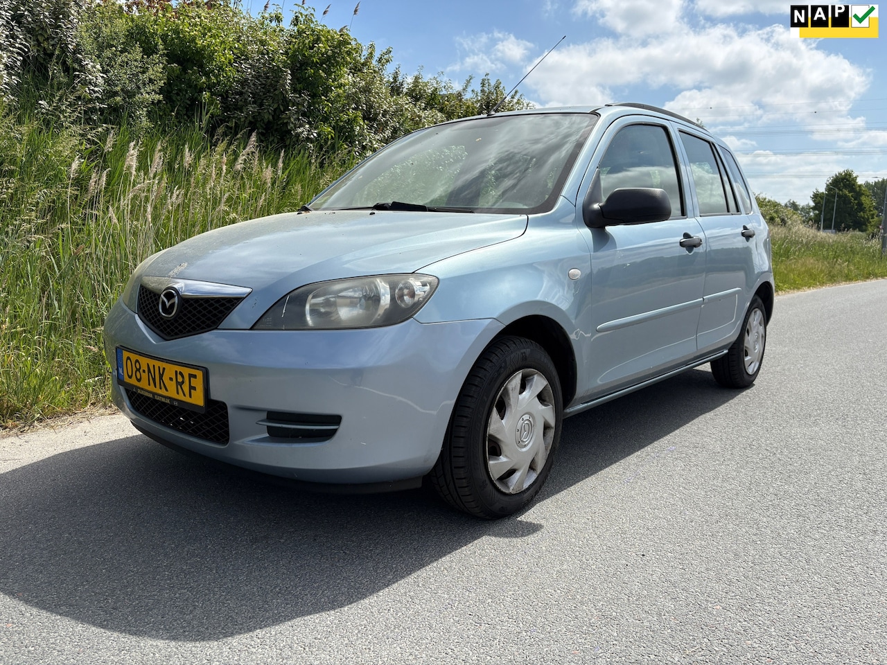 Mazda 2 - 1.4 Exclusive Automaat de beschikt over 4 deuren en is goed onderhouden - AutoWereld.nl