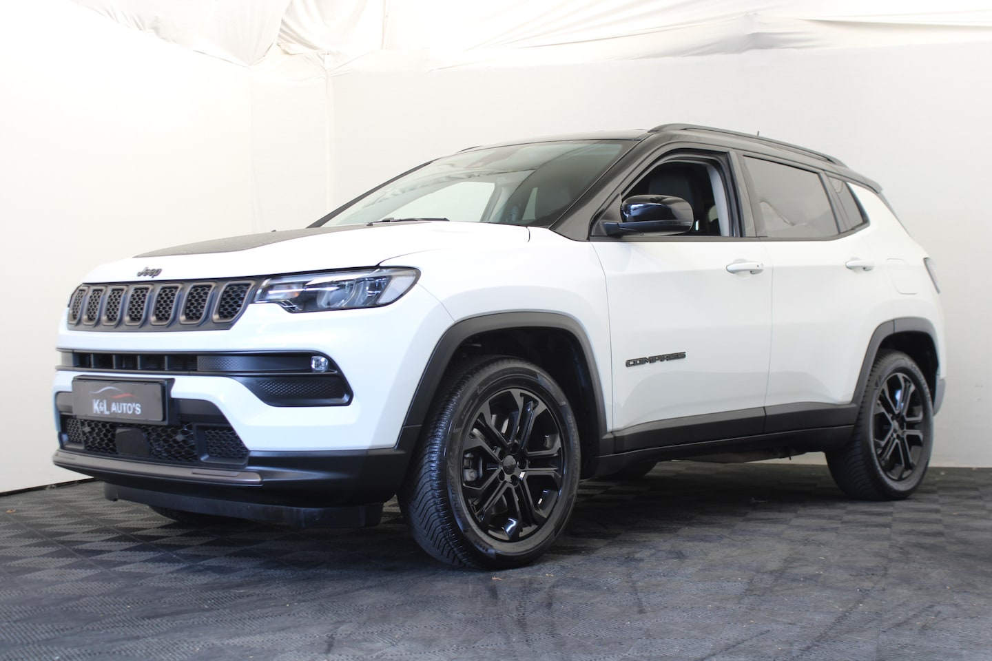 Jeep Compass - 4xe 190 Plug-in Hybrid Electric Upland 01-09 12:00 gesloten! - AutoWereld.nl
