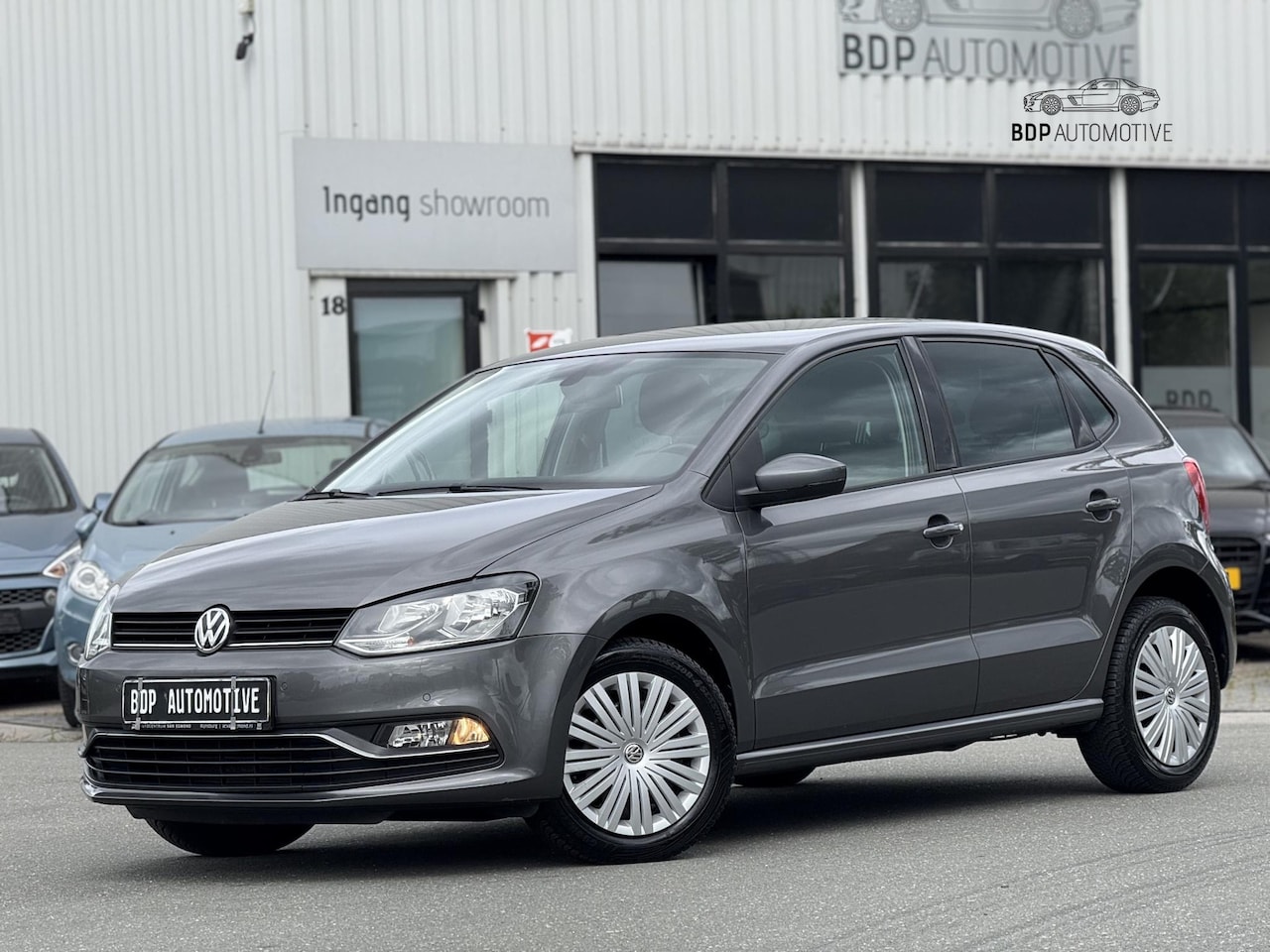 Volkswagen Polo - 1.4 TDI Comfortline AUTOMAAT/UNIEK LAGE KM STAND/1ste EIGENAAR/NAVI/CLIMATE CONTROLE - AutoWereld.nl