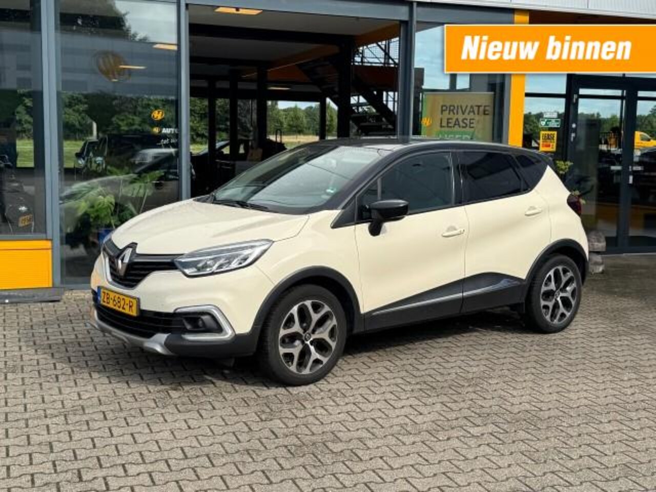 Renault Captur - 1.2 TCE Intens - Navi - All Season - trekhaak - AutoWereld.nl
