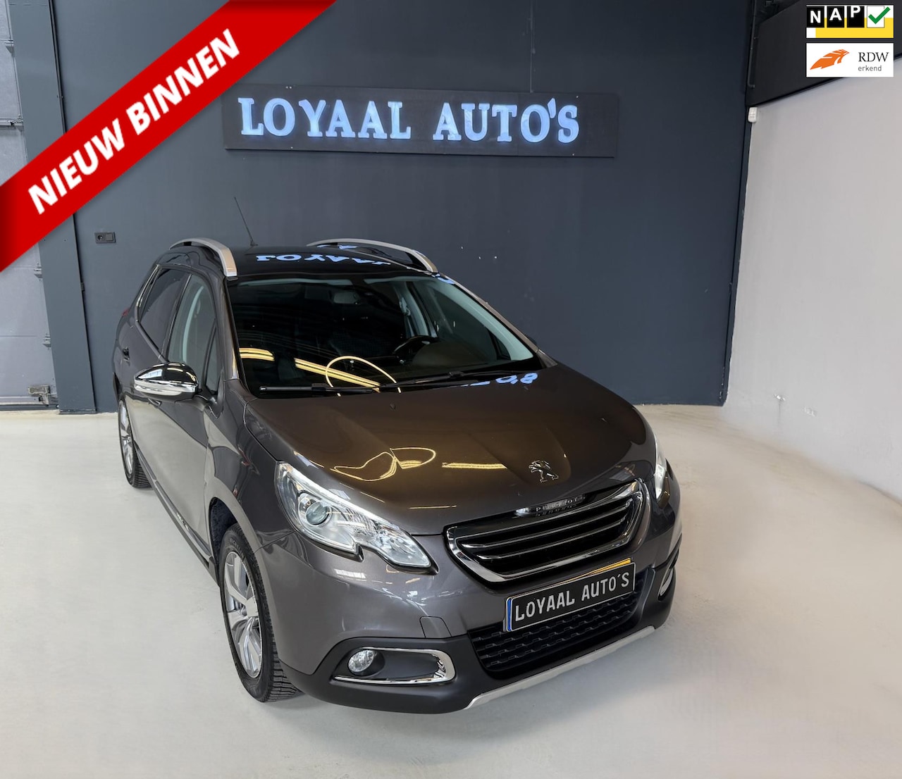Peugeot 2008 - 1.2 PureTech Allure | AUT | NAVI | CRUISE | AIRCO | PDC | LEER | NAP | APK - AutoWereld.nl