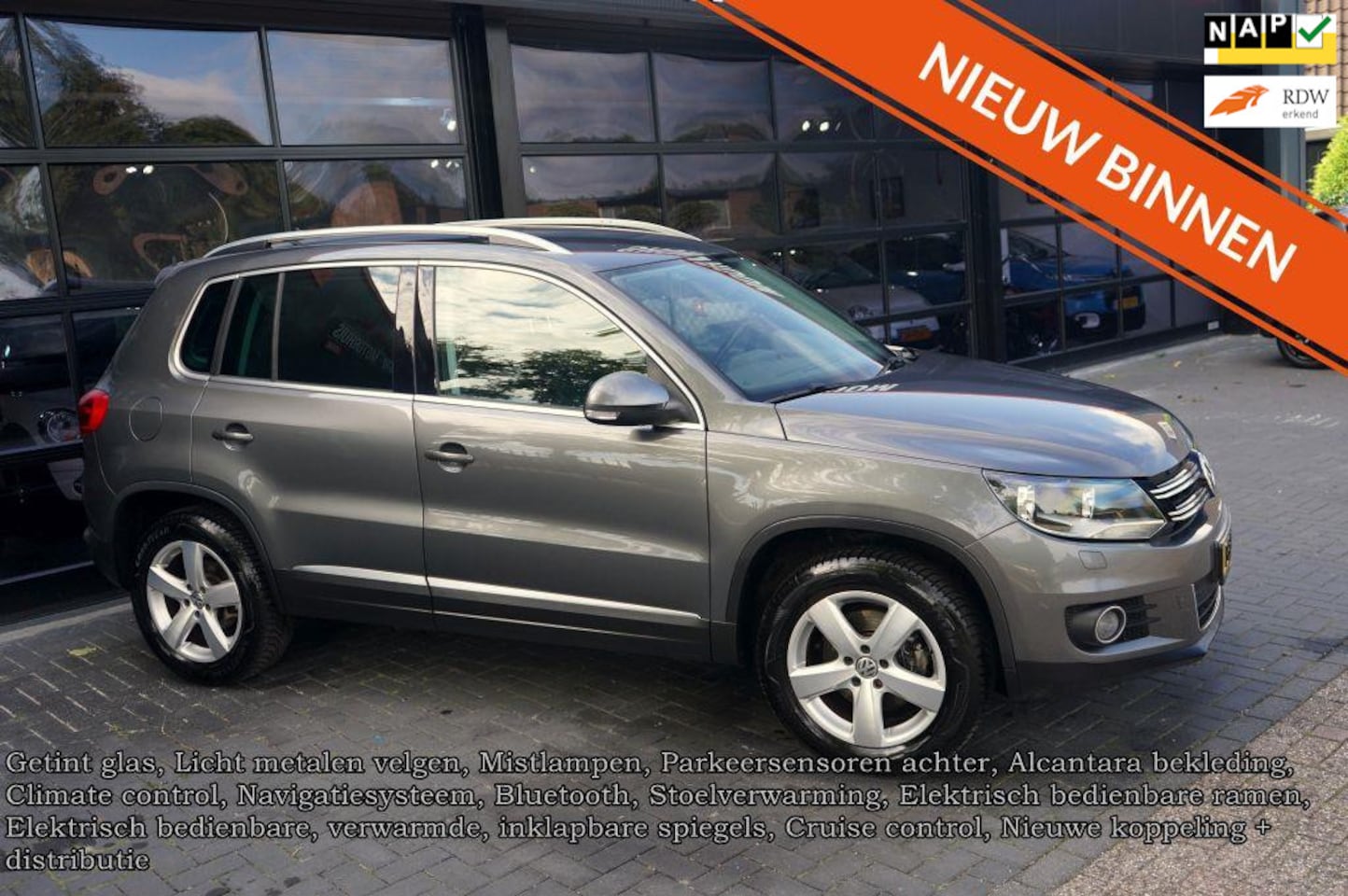 Volkswagen Tiguan - 1.4 TSI Sport&Style R-line Edition, Clima, Pdc, Navi, CC, - AutoWereld.nl