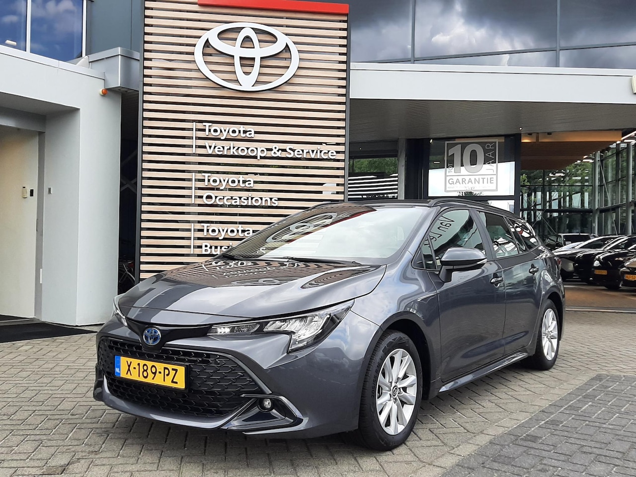 Toyota Corolla Touring Sports - HYBRID 140 NL-AUTO NAVI AD-CRUISE CLIMA APPLE/ANDROID CAMERA BLUETOOTH DAB+ - AutoWereld.nl