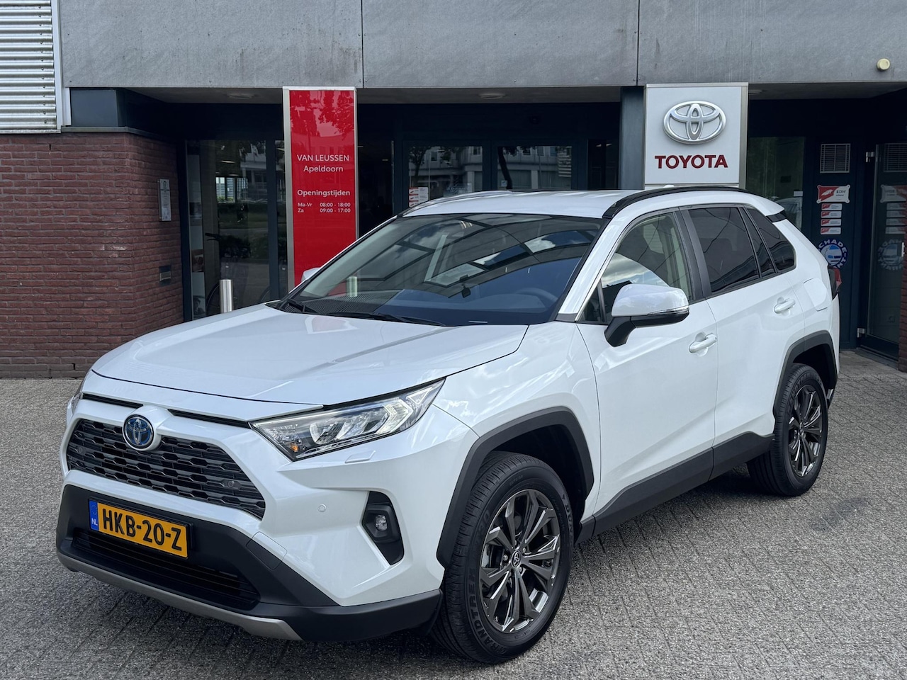 Toyota RAV4 - 2.5 HYBRID STYLE STOEL/STUURVERW LEDER CAMERA 18''LM-VELGEN NAVI AD-CRUISE EL-ACHTERKLEP A - AutoWereld.nl