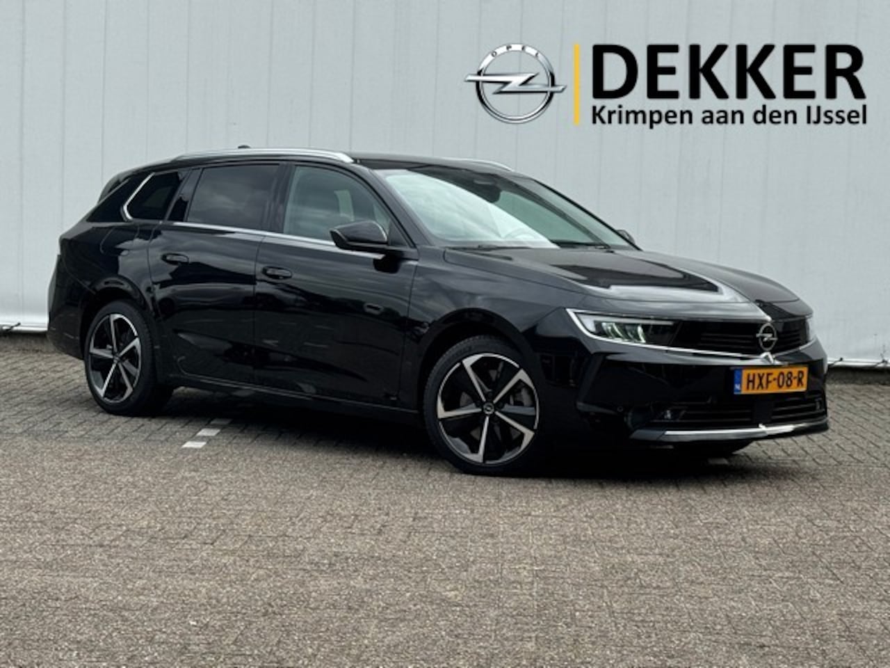 Opel Astra Sports Tourer - 1.6 Turbo Plug In Hybrid Business Edition met Navi/Camera, AGR-Stoelen,  Winterpakket, Ele - AutoWereld.nl