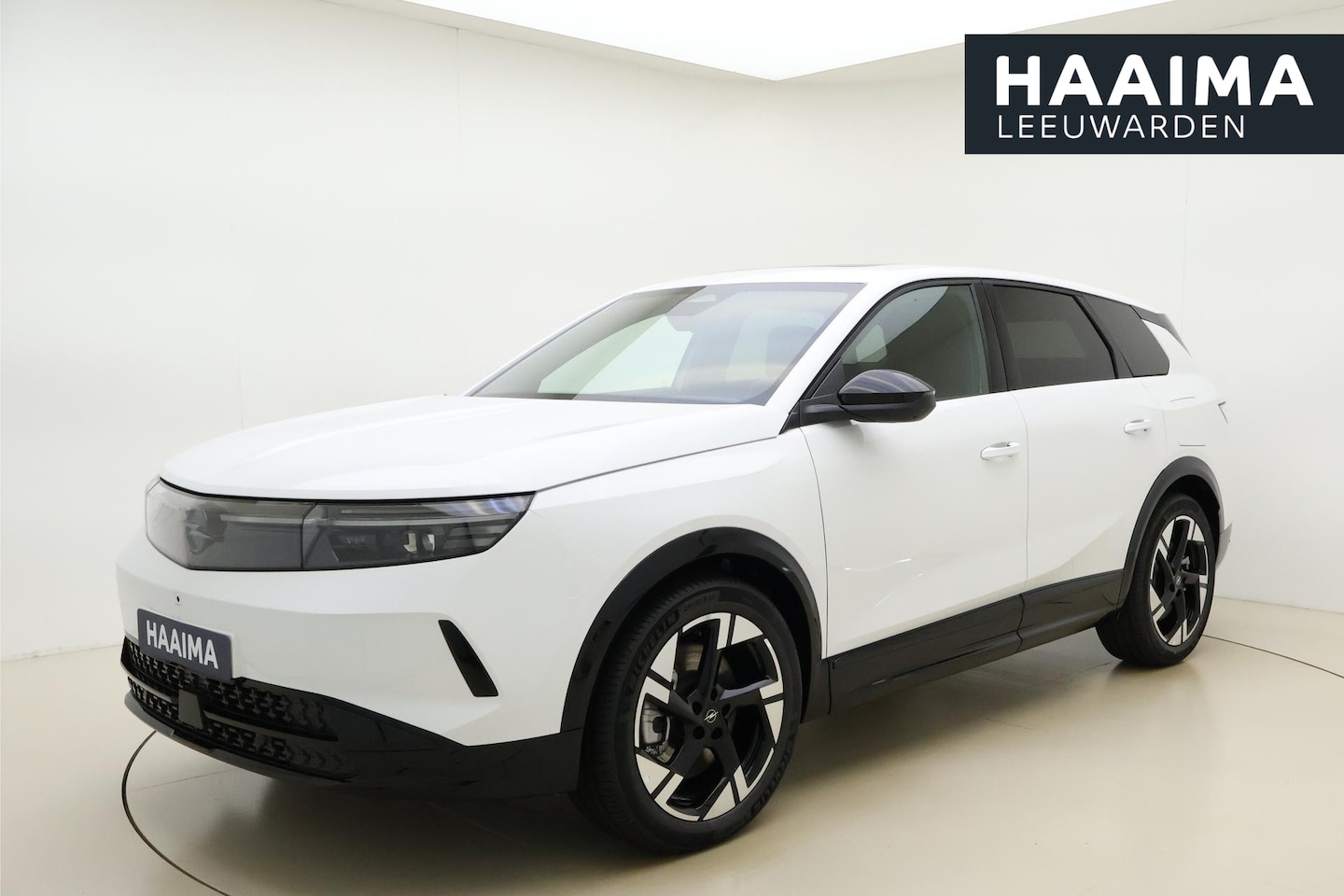 Opel Grandland Electric - Business Edition 73 kWh | Lederen bekleding | Stoelverwarming/ventilatie | Trekhaak afneem - AutoWereld.nl