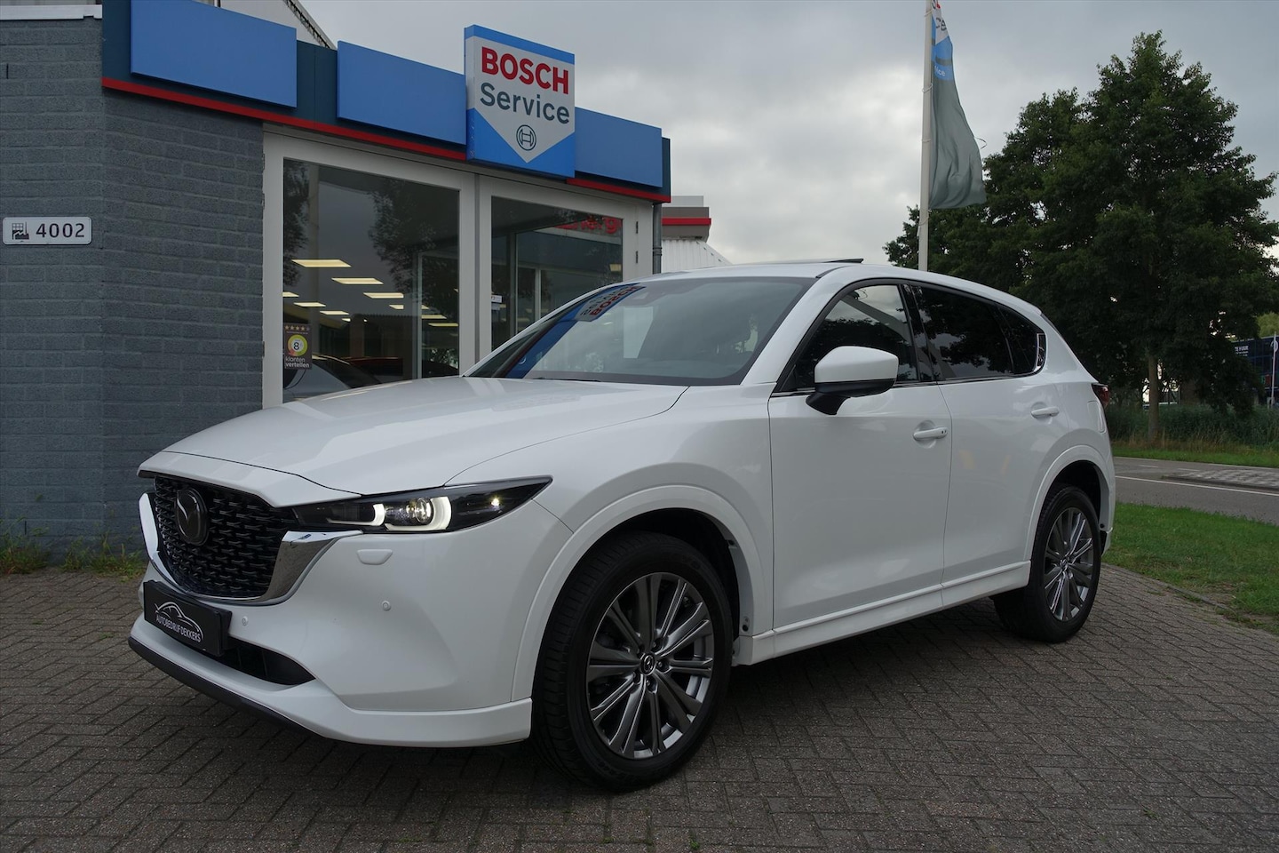 Mazda CX-5 - 2.5 SKYACTIV-G 194pk 2WD Aut Takumi | LEDER | BOSE | SCHUIFDAK | HUD - AutoWereld.nl