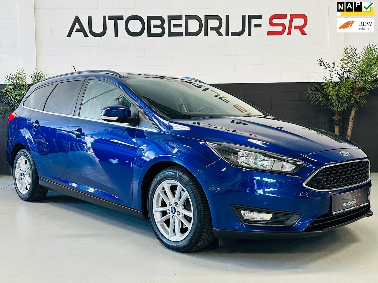 Ford Focus Wagon - 1.0 Titanium PDC! Navigatie! Stoelverwarming! APK! GARANTIE - AutoWereld.nl