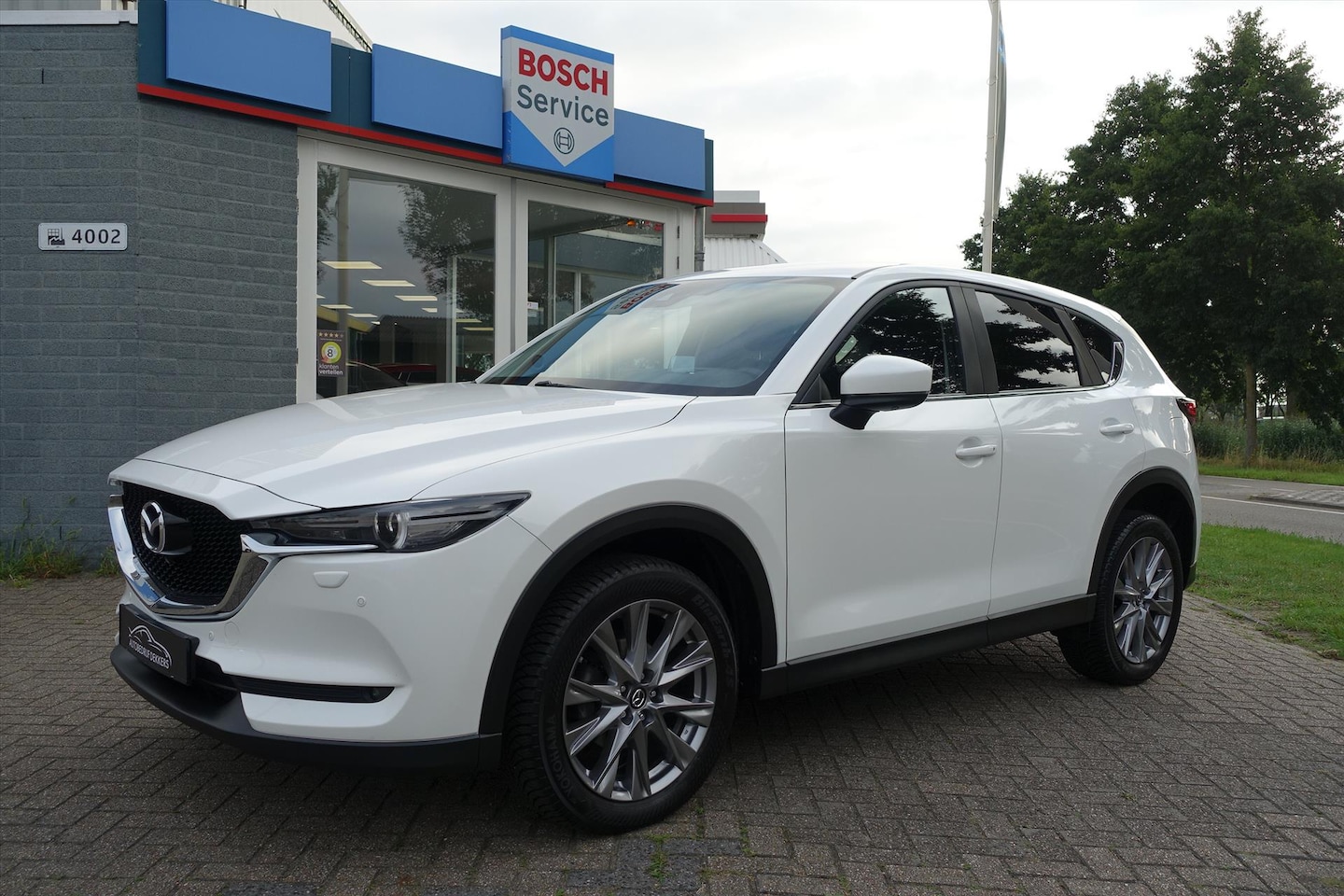 Mazda CX-5 - 2.0 SKYACTIV-G 165pk 2WD Sport Selected | HUD | 19'' | 360 CAM | KEYLESS - AutoWereld.nl
