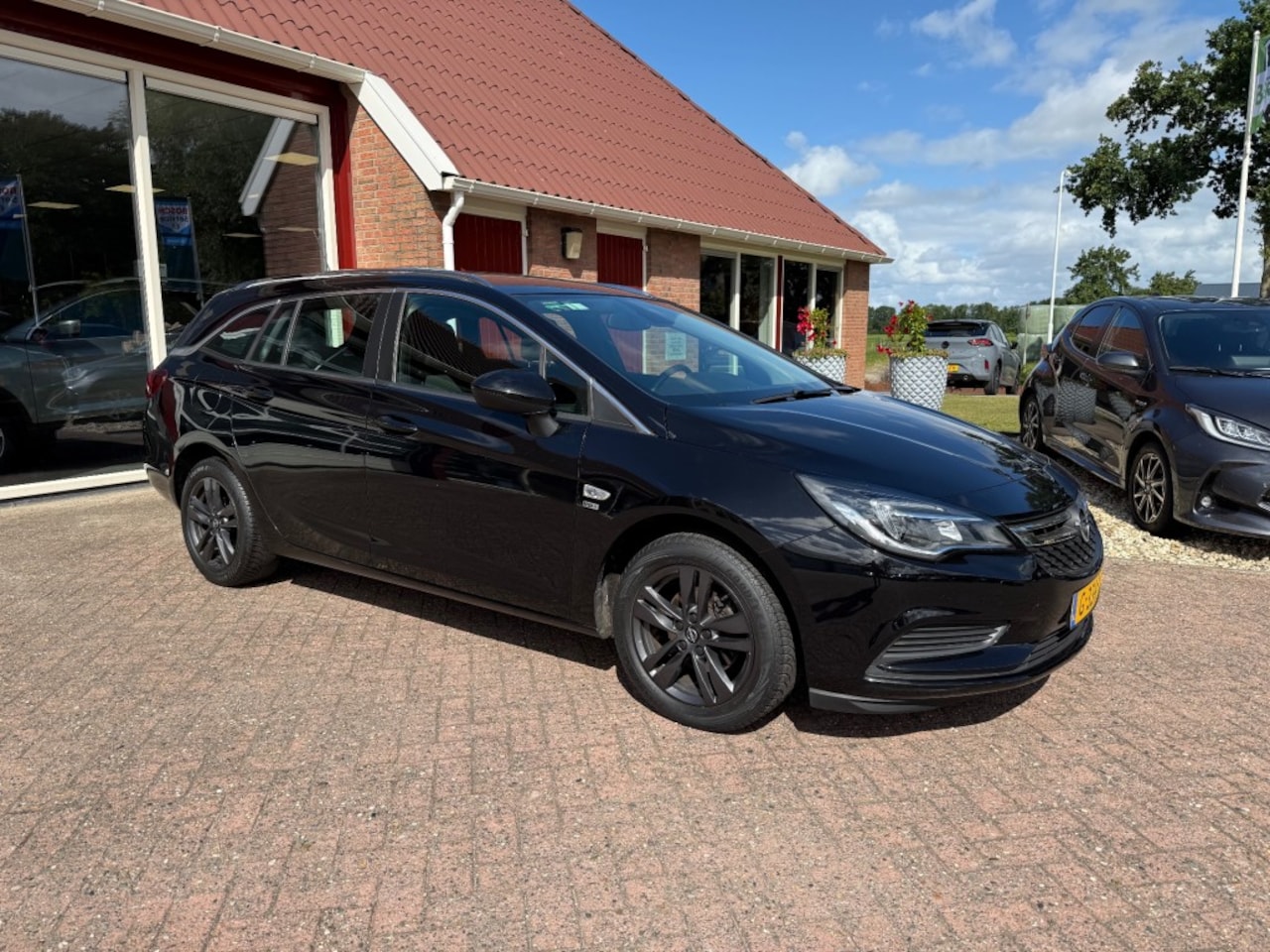 Opel Astra Wagon - 1.0 TURBO 120 JAAR EDITION WAGON TREKHAAK/NAVI/CRUISE/ENZ. - AutoWereld.nl