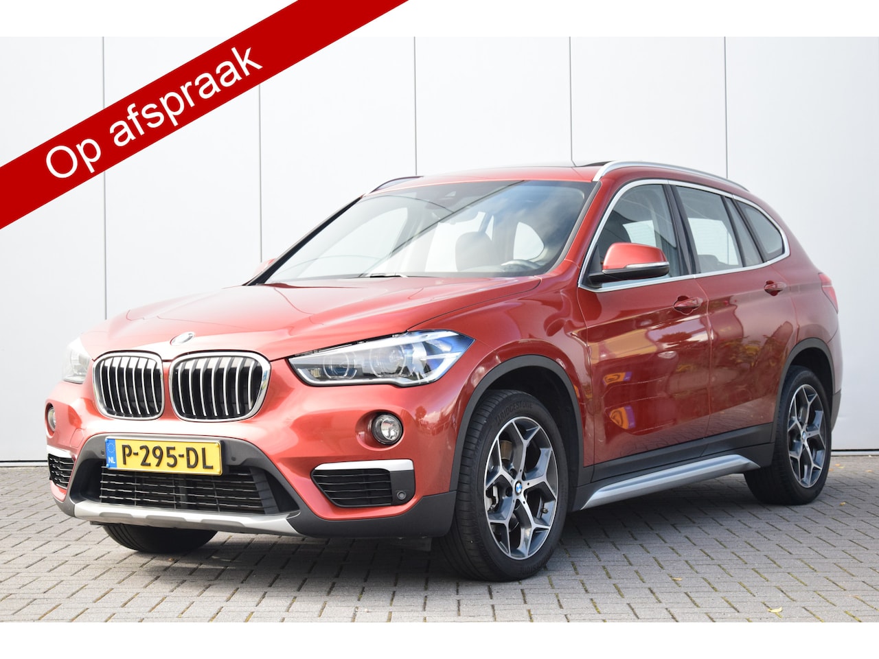 BMW X1 - xDrive25d High Executive X-Line Pano/Dak Leer/Sport/Verwarmd Trekhaak/wegklapbaar - AutoWereld.nl