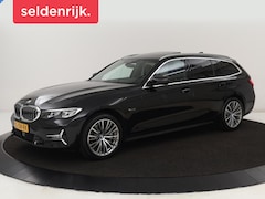 BMW 3-serie Touring - 330e xDrive Luxury Line | Panoramadak | Adaptive cruise | Stoelverwarming | Leder | Sports