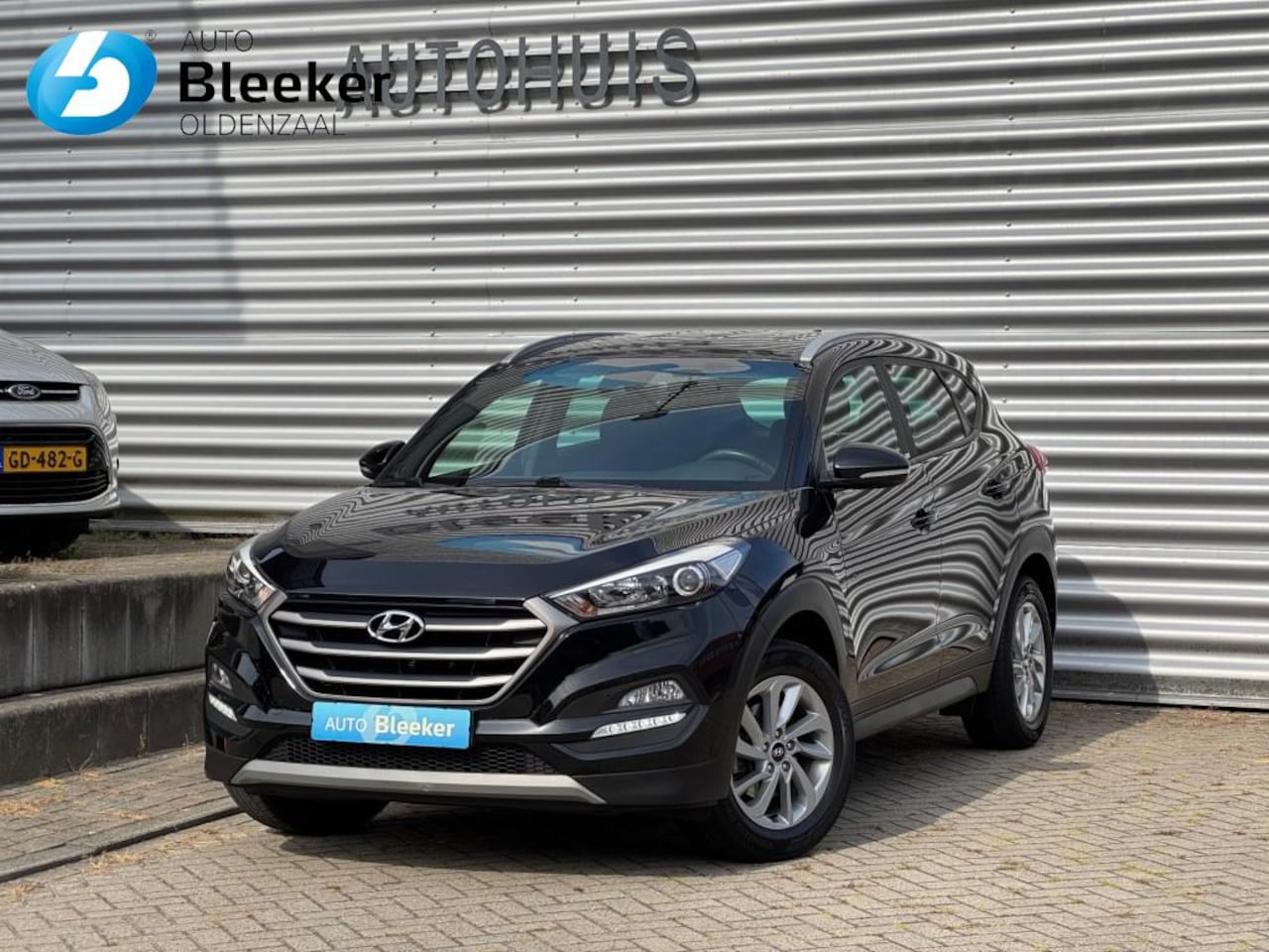 Hyundai Tucson - 1.6 GDI 132Pk Passion Airco Trekhaak Navi Carplay - AutoWereld.nl