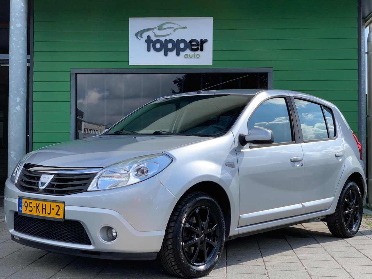 Dacia Sandero - 1.2 Lauréate | Navigatie | Trekhaak | Airco | - AutoWereld.nl