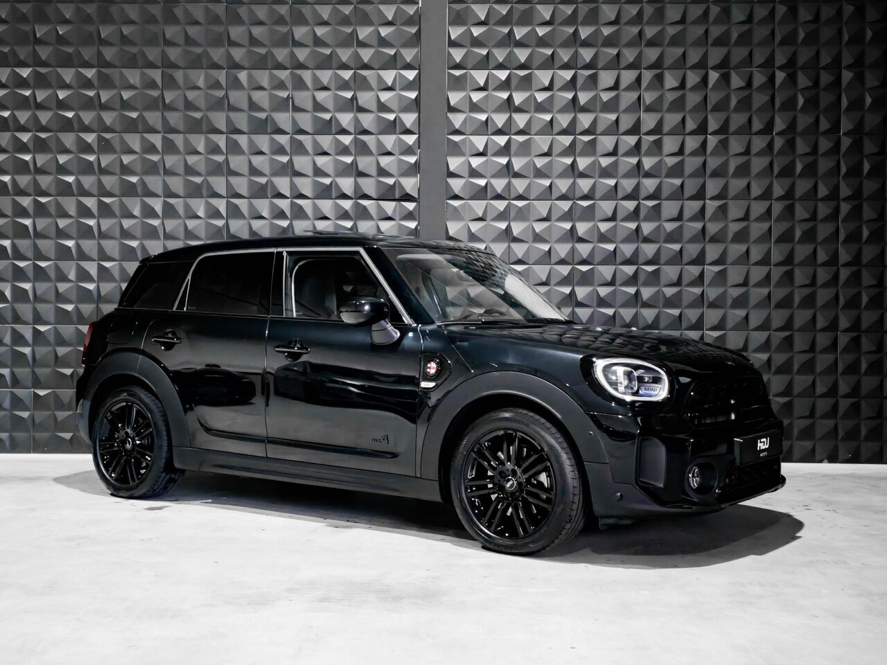 MINI Countryman - 2.0 Cooper S E ALL4 |Pano | HUD | Ad.Li.| H/K | Memo | ACC | e.klep | Sport Stln.| Leer | - AutoWereld.nl