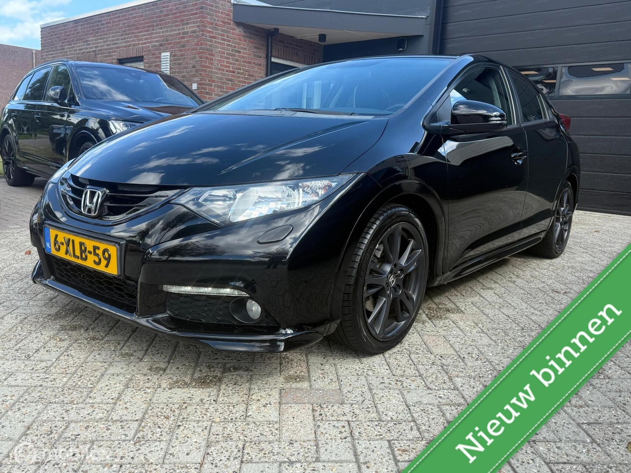 Honda Civic - 1.8 Sport Black Edition - AutoWereld.nl