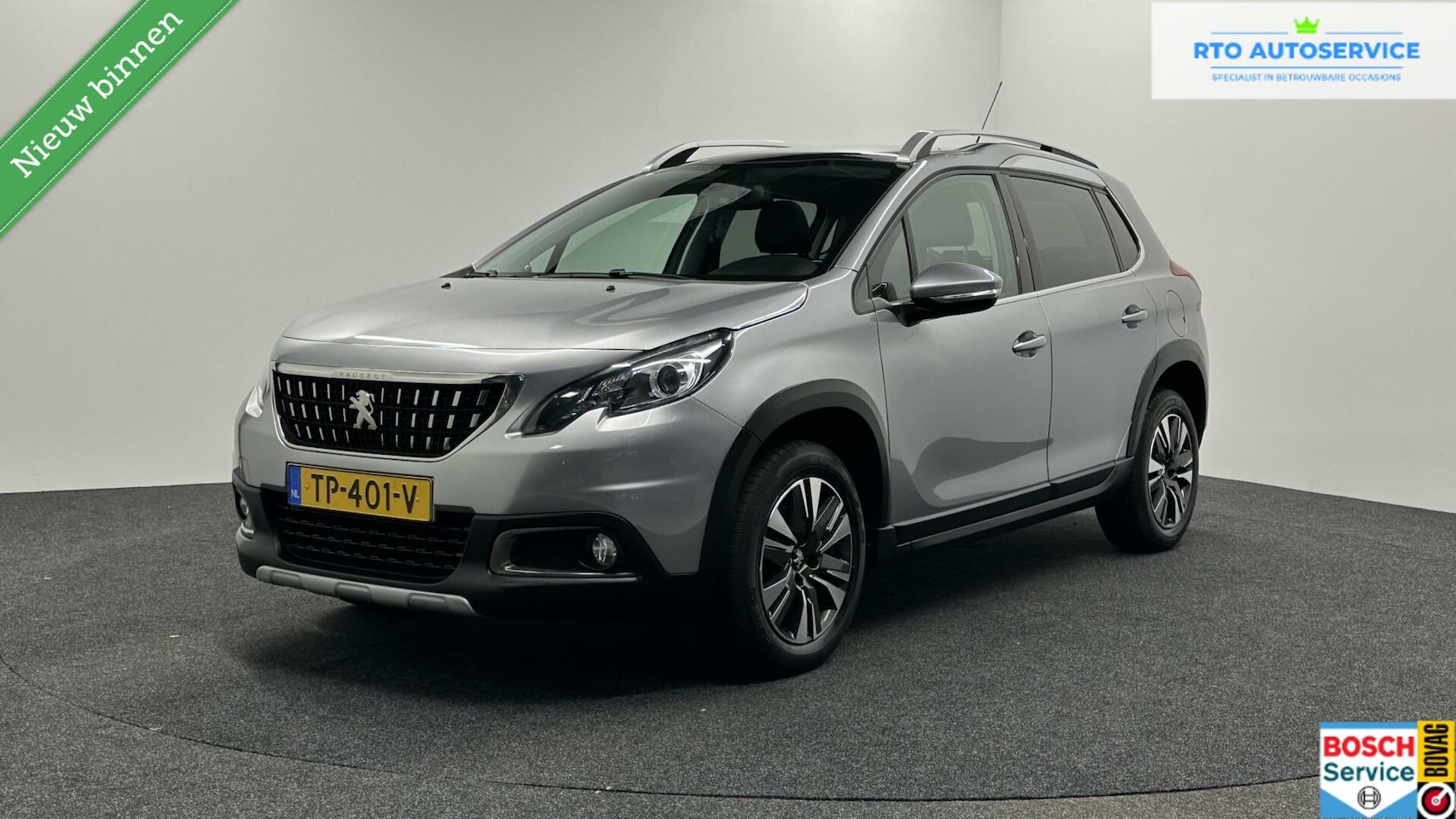 Peugeot 2008 - 1.2 PureTech Allure PANORAMA DAK - AutoWereld.nl