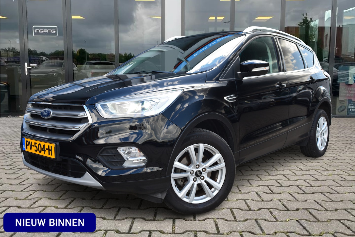 Ford Kuga - 1.5 EcoBoost Titanium | Xenon | Navi | Trekhaak | - AutoWereld.nl