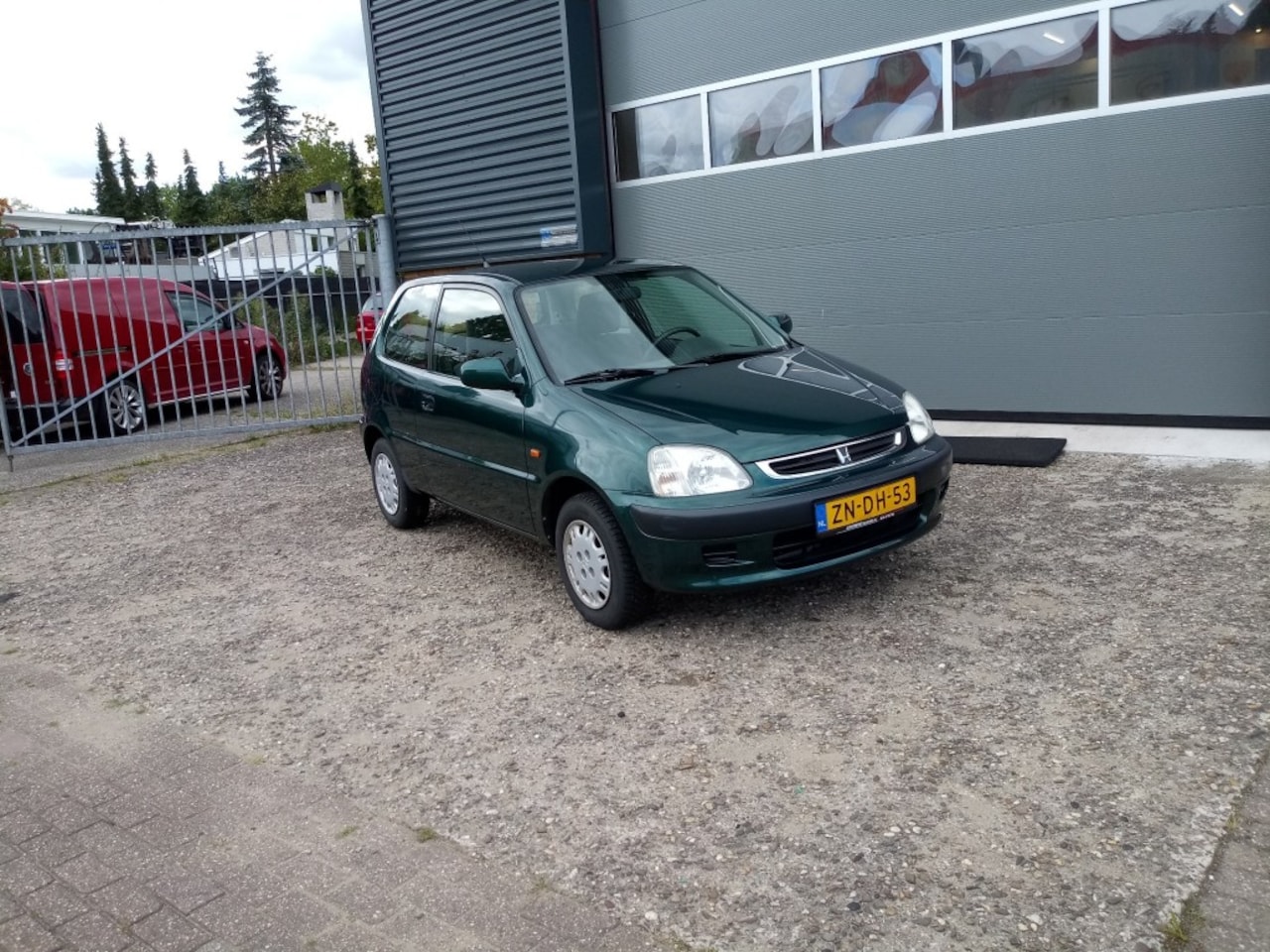 Honda Logo - 1.3i 1.3i - AutoWereld.nl