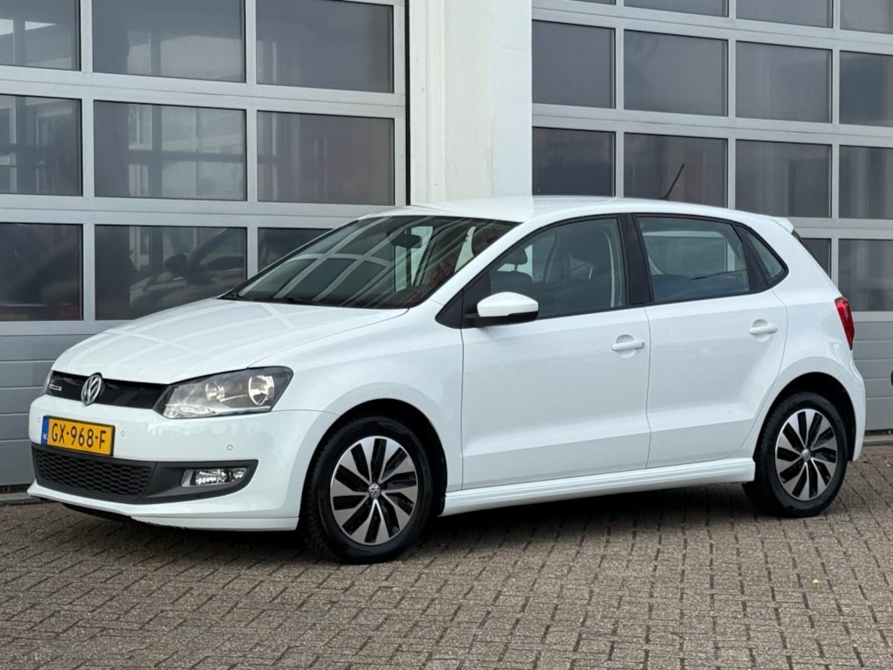 Volkswagen Polo - 1.4 TDI 75PK Bluemotion Navi Clima Cruise Keurige auto! - AutoWereld.nl