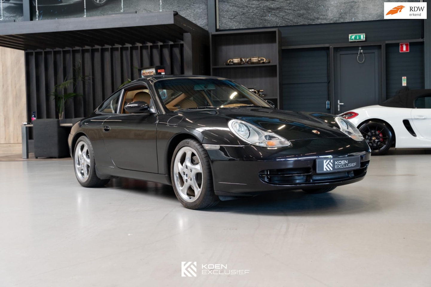 Porsche 911 - 996 3.4 Carrera 4 Millennium NR 141 - AutoWereld.nl