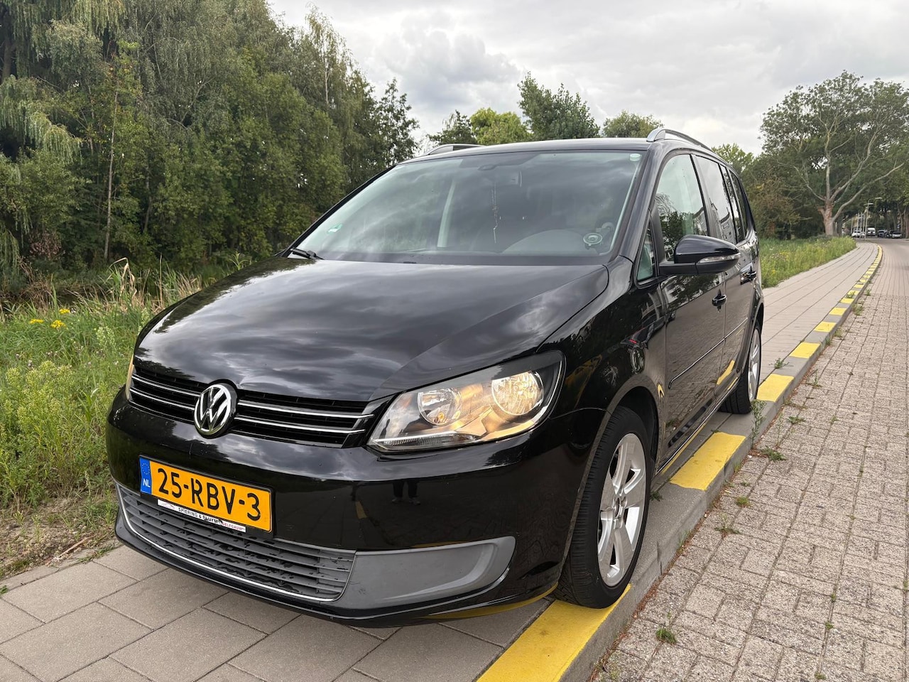 Volkswagen Touran - 1.2 TSI Comfortline BlueMotion 7p. 1.2 TSI Comfortline BlueMotion 7p. - AutoWereld.nl