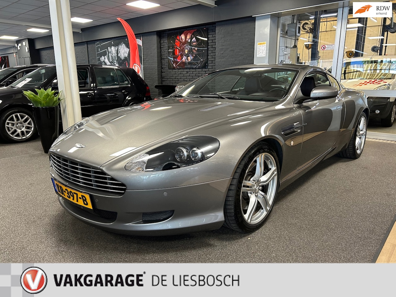 Aston Martin DB9 - 5.9 V12 Touchtronic | Leder| Navigatie | perfecte nette staat | onderhoud historie aanwezi - AutoWereld.nl