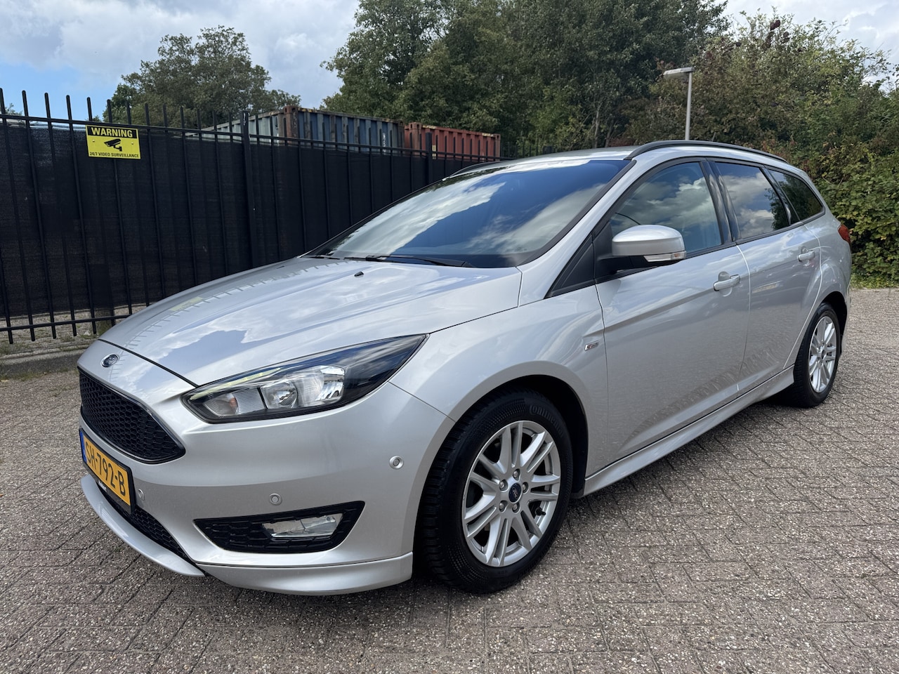 Ford Focus Wagon - 1.0 ST-Line 6 Versn Clima/Cruise/Carplay/PDC - AutoWereld.nl
