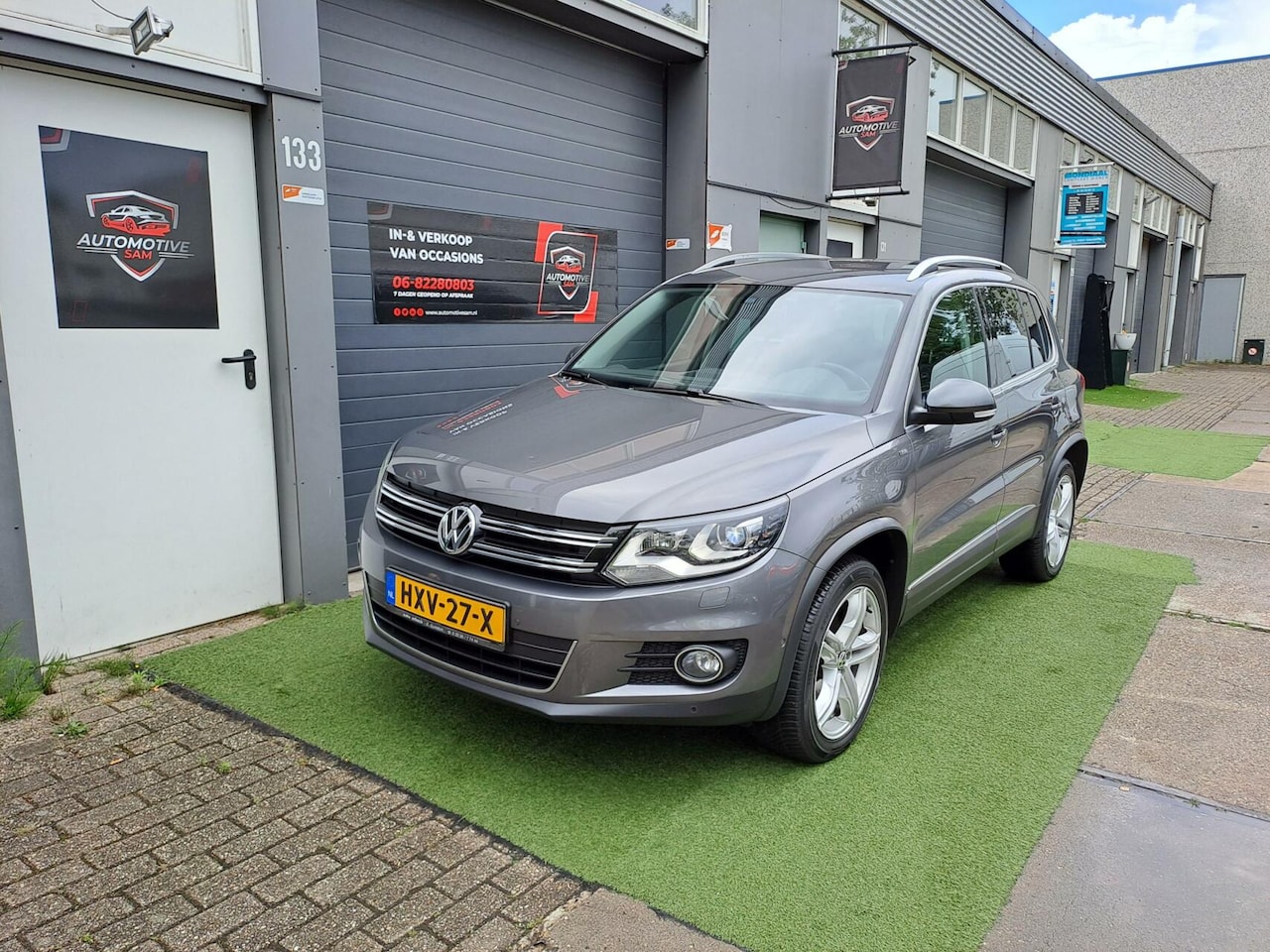 Volkswagen Tiguan - 1.4 TSI Sport&Style 4Motion Xenon Cruise - AutoWereld.nl