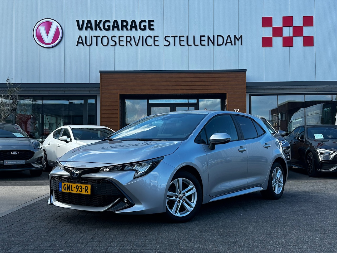 Toyota Corolla - 1.8 Hybrid Active|Adaptive Cruise|Camera|LED|Navigatie|Lane Assist - AutoWereld.nl