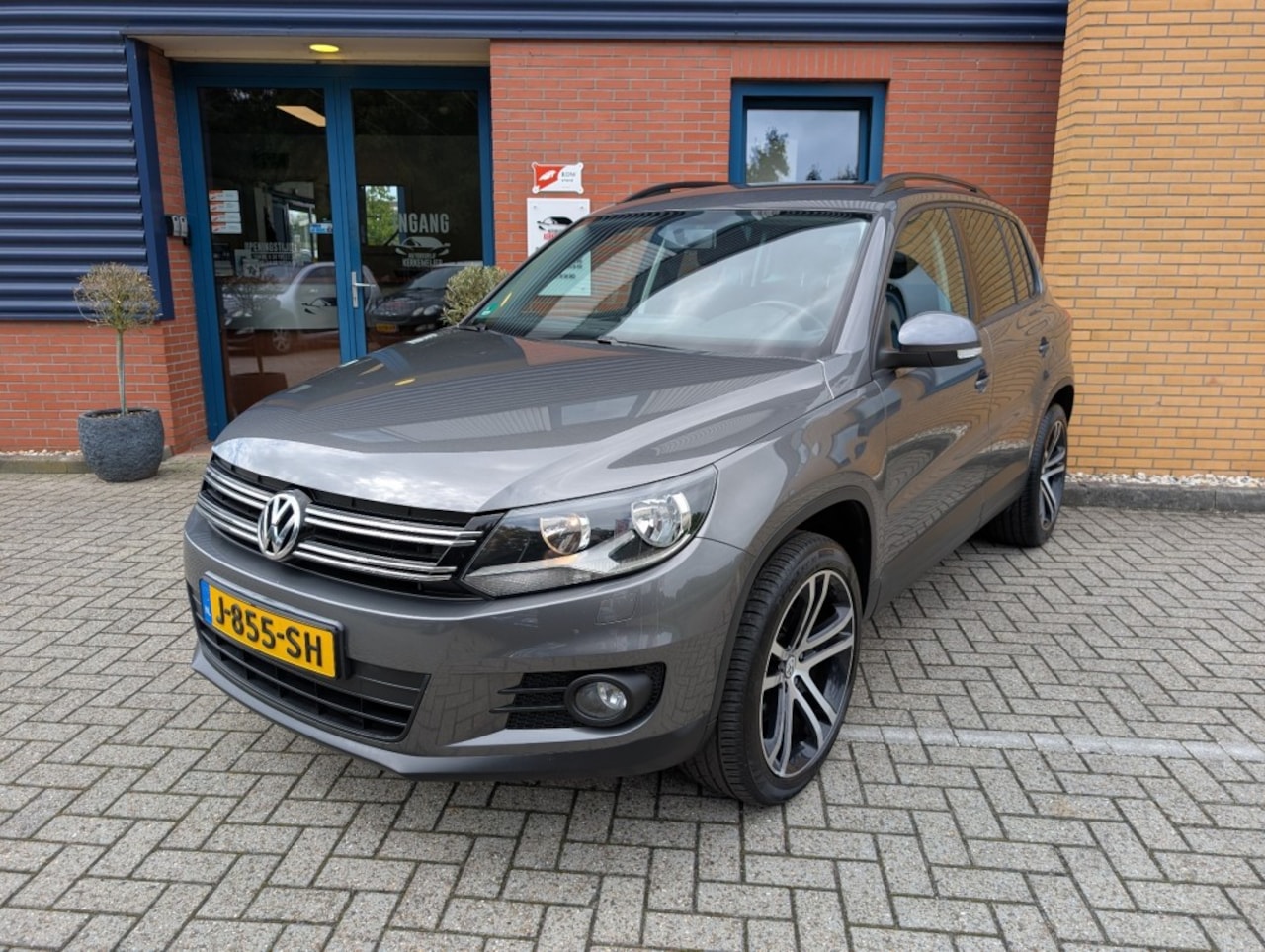 Volkswagen Tiguan - 1.4 TSI Sport&Style 1.4 TSI SPORTenSTYLE, Stoelverw, Airco, Navi, PDC - AutoWereld.nl
