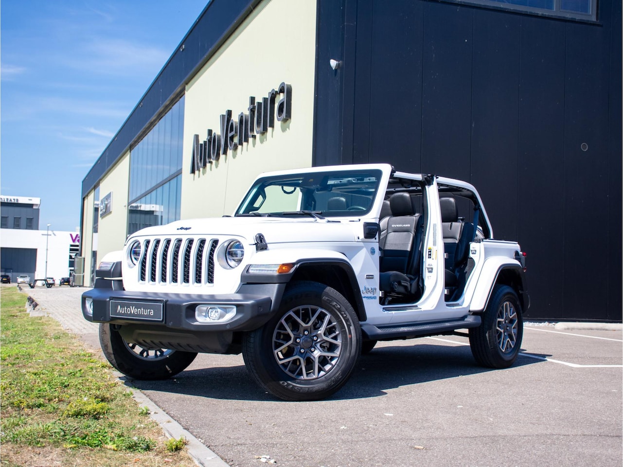 Jeep Wrangler Unlimited - 4xe 380 Sahara | Camera | Leder | Adaptive Cruise | Stoel/stuur verwarm. - AutoWereld.nl