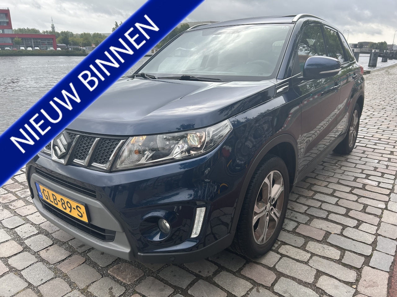 Suzuki Vitara - 1.6 High Executive panodak airco/ecc navi leer - AutoWereld.nl